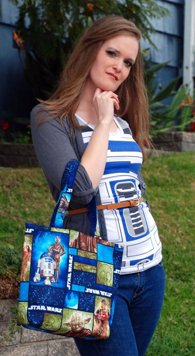 Lindsey is carrying our Rebellion themed Star Wars Bag!